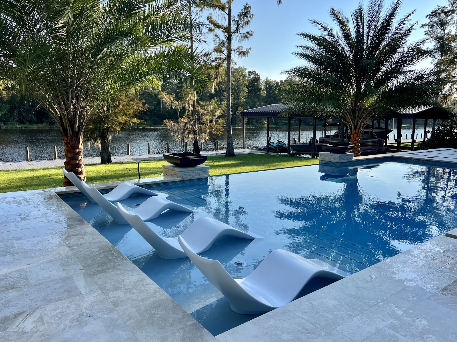Contemporary Backyard Pool with Fire Feature